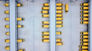 Overhead drone shot of DHL Express Vans at loading bays