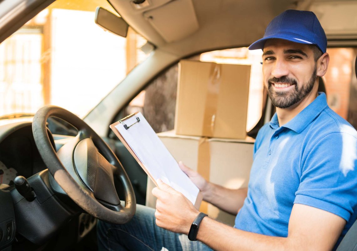 Delivery Driver sat in van promoting CVD Courier Insurance Report on rising costs